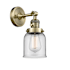 Innovations Lighting Small Bell Single Light 10" Tall Bathroom Sconce with Multiple Shade Options Antique Brass / Clear