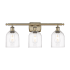 Innovations Lighting Bella 3 Light 26" Wide Vanity Light Antique Brass / Clear