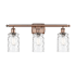 Innovations Lighting Candor 3 Light 26" Wide Bathroom Vanity Light Antique Copper / Clear Waterglass