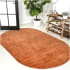 JONATHAN Y Lighting Supersoft 4' x 6' Polypropylene Solid Indoor Oval Area Rug Orange