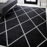JONATHAN Y Lighting Supersoft 3' x 5' Polypropylene Geometric and Solid Indoor Area Rug Black / White