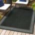 JONATHAN Y Lighting Santa Monica 5-1/4' x 7-1/2' Polypropylene Border, Geometric, and Solid Indoor/Outdoor Rectangular Area Rug Black / Gray