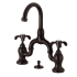 Kingston Brass French Country 1.2 GPM Bridge Bathroom Faucet with Pop-Up Drain Assembly Oil Rubbed Bronze