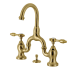 Kingston Brass Tudor 1.2 GPM Bridge, Widespread Bathroom Faucet with Pop-Up Drain Assembly Brushed Brass