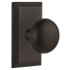 Nostalgic Warehouse New York Solid Brass Privacy Door Knob Set with Studio Rose and 2-3/8" Backset Oil-Rubbed Bronze