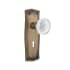 Nostalgic Warehouse Vintage Crystal Meadows Privacy Door Knob Set with Prairie Rose, 2-3/8" Backset and Decorative Keyhole Antique Brass