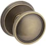 Baldwin Coined and Knurled K012 Privacy Door Knob Set with 5078 Trim from the Estate Collection Satin Brass and Black