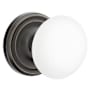 Emtek Ice White Porcelain Privacy Door Knobset with Brass Rosette and the Concealed Screws Oil Rubbed Bronze