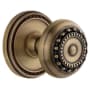 Grandeur Soleil Solid Brass Passage Door Knob Set with Parthenon Knob and 2-3/8" Backset Vintage Brass