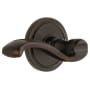 Grandeur Circulaire Solid Brass Rose Right Handed Passage Door Lever Set with Portofino Lever and 2-3/8" Backset Timeless Bronze
