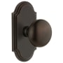 Grandeur Arc Solid Brass Single Dummy Door Knob with Fifth Avenue Knob Timeless Bronze