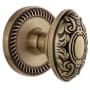 Grandeur Newport Solid Brass Rose Privacy Door Knob Set with Grande Victorian Knob and 2-3/8" Backset Vintage Brass