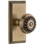 Grandeur Carre Solid Brass Rose Privacy Door Knob Set with Parthenon Knob and 2-3/4" Backset Vintage Brass