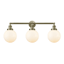 Innovations Lighting Beacon 3 Light 32" Wide Vanity Light Antique Brass / Matte White