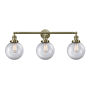Innovations Lighting Beacon 3 Light 32" Wide Vanity Light Antique Brass / Clear