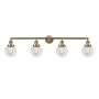 Innovations Lighting Beacon 4 Light 42" Wide Vanity Light Antique Brass / Clear