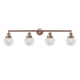 Innovations Lighting Beacon 4 Light 42" Wide Vanity Light Antique Copper / Clear