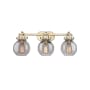 Innovations Lighting Newton Sphere 3 Light 27" Wide Vanity Light Brushed Brass / Plated Smoke