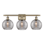 Innovations Lighting Athens Deco Swirl 3 Light 28" Wide Vanity Light Antique Brass / Light Smoke Deco Swirl