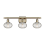 Innovations Lighting Ithaca 3 Light 26" Wide Vanity Light Antique Brass / Clear Ithaca