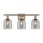 Innovations Lighting Bella 3 Light 26" Wide Vanity Light Antique Brass / Light Smoke