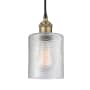 Innovations Lighting Cobbleskill 5" Wide Mini Pendant Black Antique Brass / Clear
