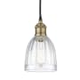 Innovations Lighting Brookfield 6" Wide Mini Pendant Black Antique Brass / Clear