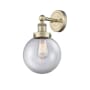 Innovations Lighting Beacon 10" Tall Wall Sconce Antique Brass / Clear