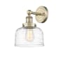Innovations Lighting Bell 10" Tall Wall Sconce Antique Brass / Clear Deco Swirl
