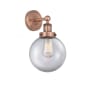 Innovations Lighting Beacon 10" Tall Wall Sconce Antique Copper / Clear