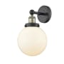 Innovations Lighting Beacon 10" Tall Wall Sconce Black Antique Brass / Matte White