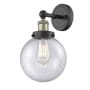 Innovations Lighting Beacon 10" Tall Wall Sconce Black Antique Brass / Seedy