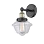 Innovations Lighting Oxford 10" Tall Wall Sconce Black Antique Brass / Clear