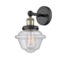 Innovations Lighting Oxford 10" Tall Wall Sconce Black Antique Brass / Seedy