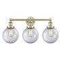 Innovations Lighting Beacon 3 Light 25" Wide Vanity Light Antique Brass / Clear
