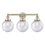 Innovations Lighting Beacon 3 Light 25" Wide Vanity Light Antique Brass / Seedy