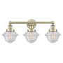 Innovations Lighting Oxford 3 Light 25" Wide Vanity Light Antique Brass / Seedy