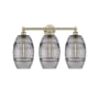 Innovations Lighting Vaz 3 Light 26" Wide Vanity Light Antique Brass / Light Smoke