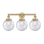 Innovations Lighting Beacon 3 Light 25" Wide Vanity Light Brushed Brass / Seedy