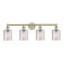 Innovations Lighting Cobbleskill 4 Light 32" Wide Vanity Light Antique Brass / Clear