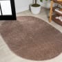 JONATHAN Y Lighting Supersoft 5' x 8' Polypropylene Solid Indoor Oval Area Rug Brown