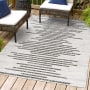 JONATHAN Y Lighting Santa Monica 7-3/4' x 10' Polypropylene Geometric, Moroccan & Tribal, and Striped Indoor/Outdoor Area Rug Ivory / Black