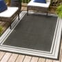 JONATHAN Y Lighting Santa Monica 3' x 5' Polypropylene Solid Indoor/Outdoor Rectangular Area Rug Black / Cream