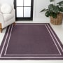 JONATHAN Y Lighting Washable 8-3/4' x 12' Chenille Border, Solid, Traditional, and Transitional Indoor Rectangular Area Rug Dark Purple / Light Purple