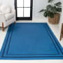 JONATHAN Y Lighting Washable 8-3/4' x 12' Chenille Border, Solid, Traditional, and Transitional Indoor Rectangular Area Rug Blue / Navy