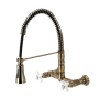 Kingston Brass Heritage 1.8 GPM Wall Mounted Widespread Bridge Pull Down Kitchen Faucet Antique Brass
