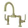 Kingston Brass Whitaker 1.2 GPM Deck Mounted Bridge Bathroom Faucet with Pop-Up Drain Assembly Polished Brass