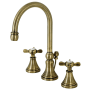 Kingston Brass Essex 1.2 GPM Deck Mounted Widespread Bathroom Faucet with Pop-Up Drain Assembly Antique Brass