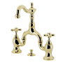 Kingston Brass English Country 1.2 GPM Bridge Bathroom Faucet with Pop-Up Drain Assembly Polished Brass