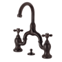 Kingston Brass English Country 1.2 GPM Bridge Bathroom Faucet with Pop-Up Drain Assembly Oil Rubbed Bronze